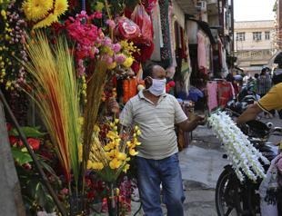 Virus pushes US hospitals to the brink, India hits record new cases