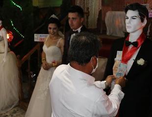 COVID-19 restrictions force wedding hosts to create unusual solutions