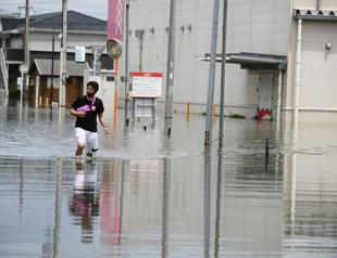 Japan battered by more heavy rain, floods, nearly 60 dead