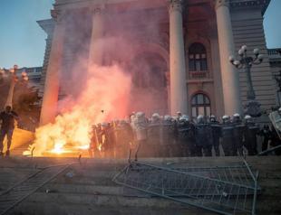 Belgrade protest over virus curfew turns violent again