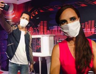 Madame Tussauds Istanbul figures wear masks