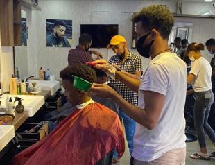 African barber in Turkey undaunted by coronavirus