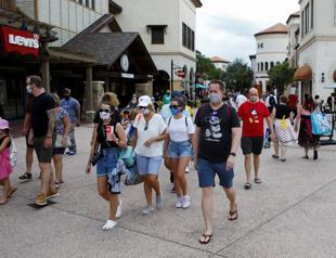 Mickey at a distance as Walt Disney World reopens