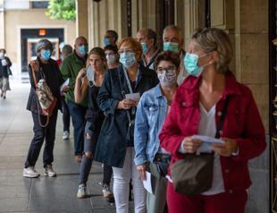 Virus surge sparks S Africa curfew and Spain local lockdown