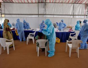 Russia accused of vaccine hacking as Brazil crosses 2 million cases