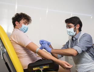 Vaccine studies offer new hope as WHO warns on Africa