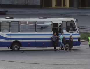 Ukraine hostage-taker surrenders, bus passengers unharmed