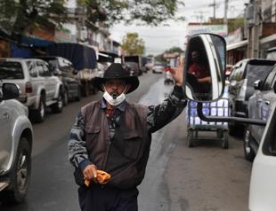 Global virus deaths pass 650,000 as new surges prompt fresh curbs