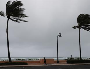 A weakened Tropical Storm Isaias lashes virus-hit Florida
