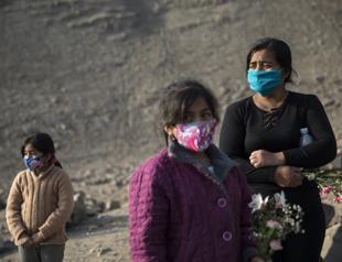 Countries tighten rules as world coronavirus deaths pass 750,000