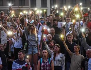 Battling protests, Lukashenko says Putin agreed to help security of Belarus