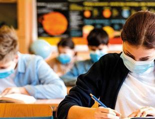 Minister warns private schools on in-person education