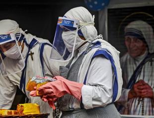 Spain calls on army to fight virus as WHO signals slowdown