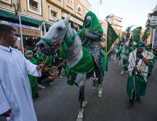 Masks and tears: Shiites mark Ashura at Iraq shrines despite virus