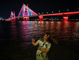 China tries to flip the pandemic script, starring a ’reborn’ Wuhan