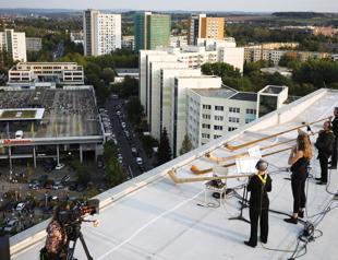 Rooftop alphorns power virus-safe concert in Germany