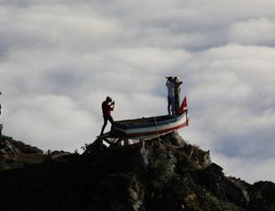 Visitors strike ‘Titanic’ pose at highland