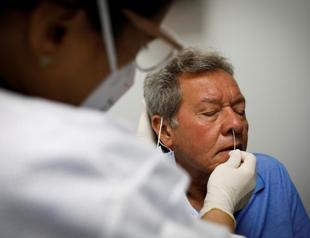 US coronavirus cases surpass 7 million as Midwest outbreak flares