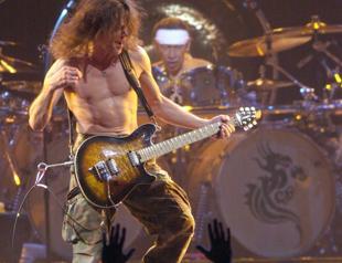 Guitar rock legend Eddie Van Halen dies of cancer at 65