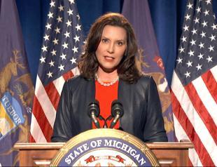 13 charged in plots against Michigan governor, police