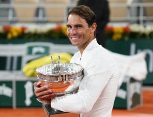 King Nadal continues Paris reign with record-equalling 20th Slam