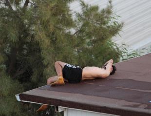 Man under alcohol’s influence blacks out on roof, saved in time