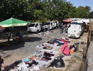 Historic Silk Road damaged by marketplace, vehicles