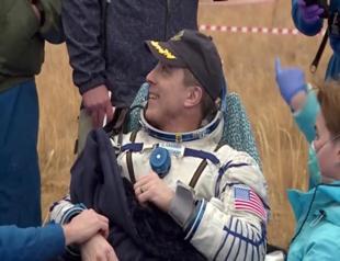 Three-man US-Russian crew returns to Earth from ISS