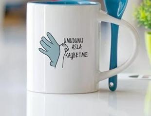 Mugs depicting quake victim put up for sale anger public