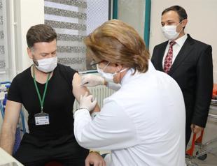Locally developed virus vaccine administered to first volunteer