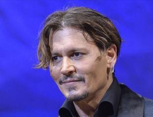 Johnny Depp resigning from major Warner Bros film