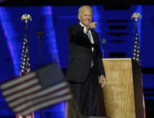 Biden promotes unity, turns to business of transition