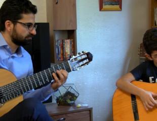 Father, son produce microtonal guitar