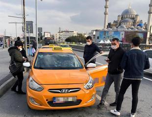 Police teams inspect taxi drivers in Istanbul