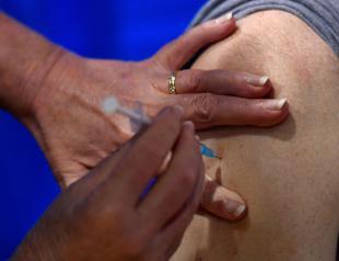 US poised for mass vaccine campaign as world virus toll nears 1.6 mln