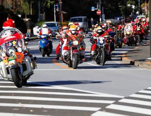 Santa Claus bikers parade in Tokyo against child abuse