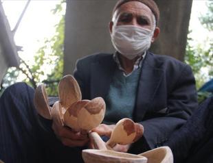 Local man carves wood pieces into beautiful spoons