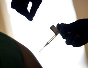 UK isolated over new virus strain as EU approves vaccine