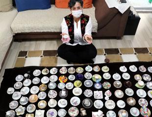 Coffee-loving woman collects Turkish coffee cups