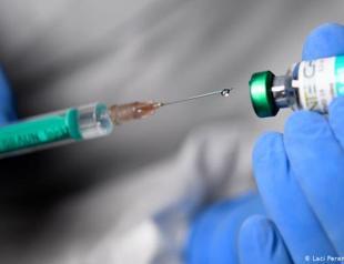 EU begins vaccine rollout as new virus strain spreads