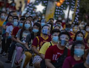 US logs record virus caseload as millions in Asia enter new lockdowns