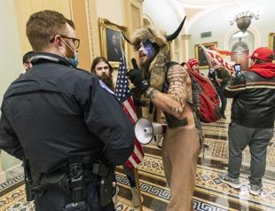 More arrests in Capitol riot as more video reveals brutality