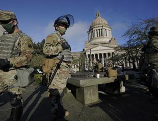 Guard troops pour into Washington as states answer the call