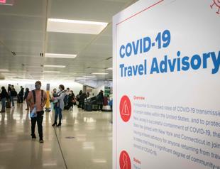 Biden team says US will not lift travel bans, despite Trump statement