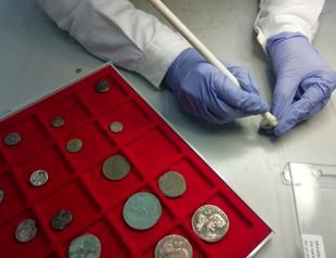 Ancient coins returned after Italy church confession