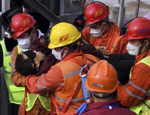 Trapped for 2 weeks, 11 workers rescued from China gold mine