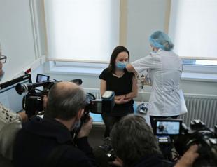 EU backs off jab threat in Britain row