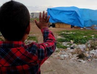 Photographer raises money for family living in tent