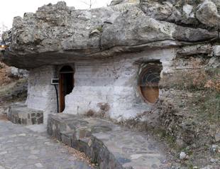 Rock-carved houses offer a calm holiday
