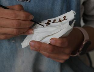 Ceramic artist makes porcelain masks